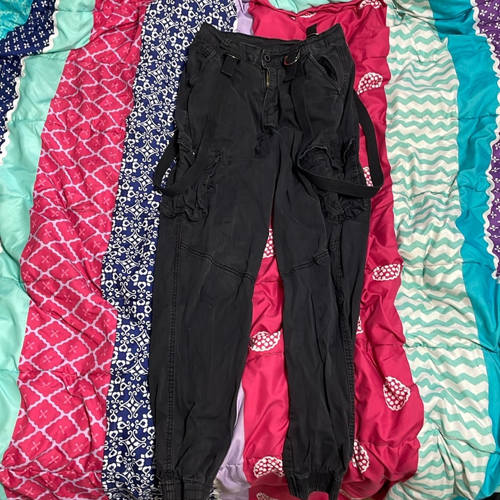 Gothic pants that have little suspender type things on them